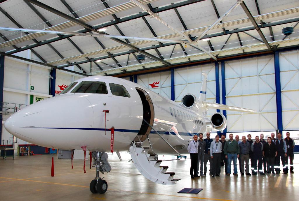 Basel Dassault Falcon team with Adrian Hollenbach, 6th from left, Technical Director & Continued Airworthiness Manager for Planair Enterprises
